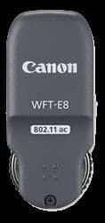 Canon WFT-E8B Wireless File Transmitter in gray, featuring a compact design, Canon branding, and connectivity options, ideal for wireless image transfer.