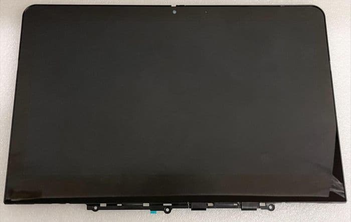 Black laptop display spare part with a smooth surface, featuring a central camera cutout at the top and a plastic frame along the edges.