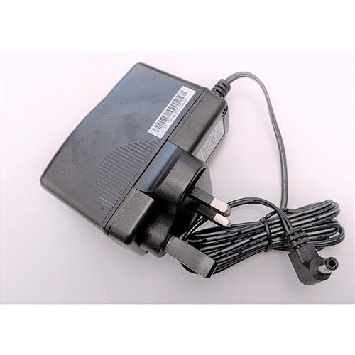 Black power supply with a textured surface, featuring a UK plug and a coiled cable, designed for DrayTek networking products, labeled with a barcode.