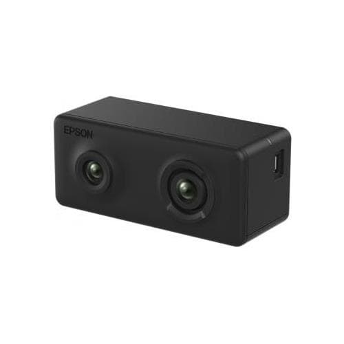 Compact black projector accessory with two lenses on the front, featuring a smooth finish and a USB port on one side, designed for use with Epson projectors.