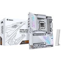 GIGABYTE X870E AORUS PRO X3D ICE motherboard, silver with RGB lighting, next to branded box and Wi-Fi antenna.