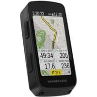 Black Hammerhead Karoo GPS computer with touchscreen displaying a map, time, and cycling stats in color.