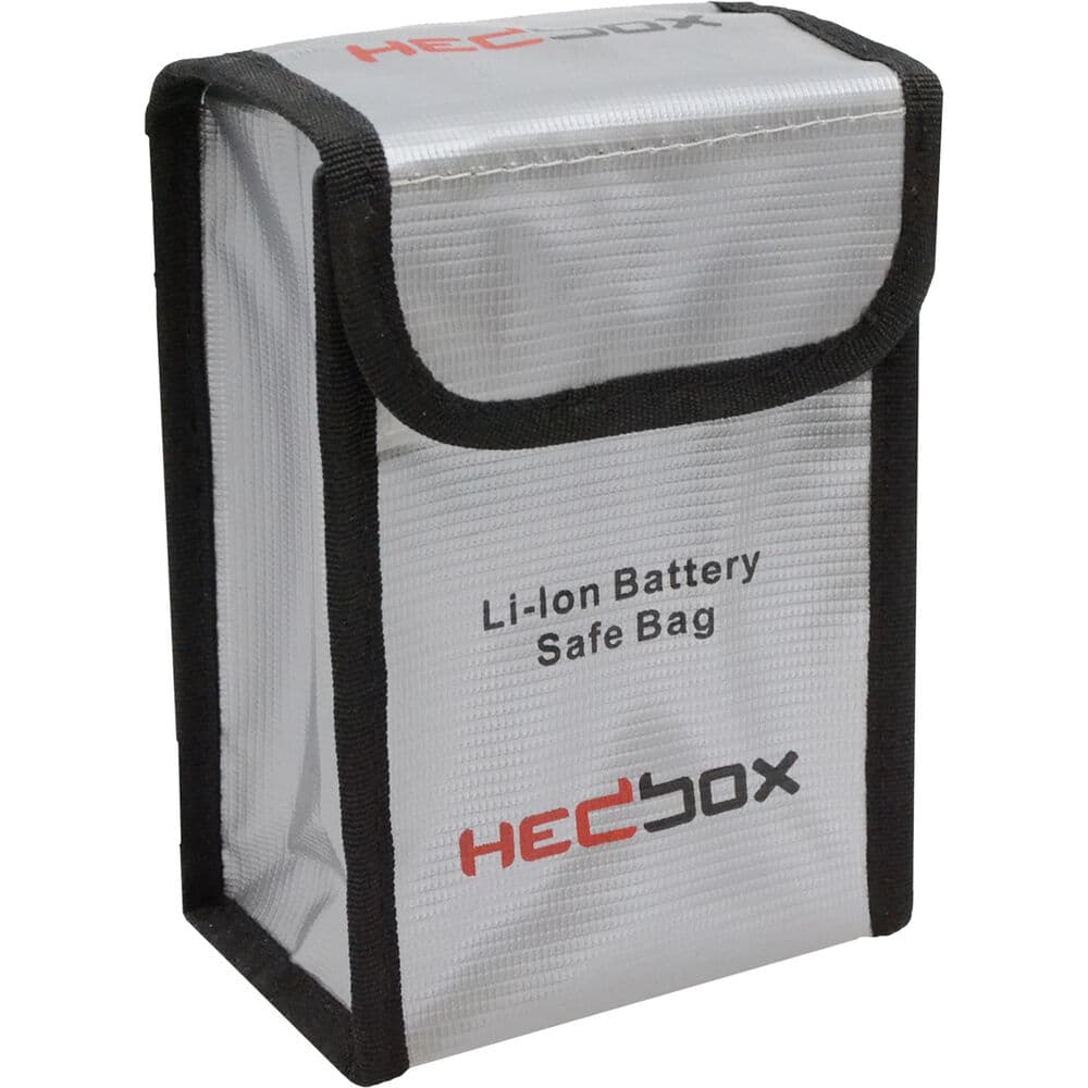 Silver fire-resistant battery storage box with a black trim, featuring a flap closure and printed "HEDbox Li-Ion Battery Safe Bag" logo on the front.