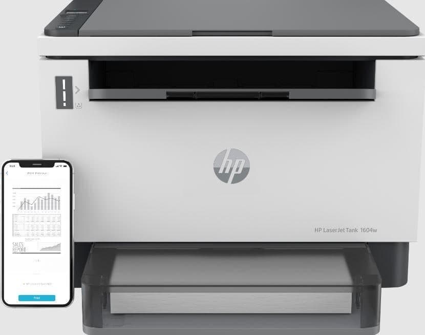 White HP LaserJet Tank MFP 1604w printer with a sleek design, featuring a front paper tray and a smartphone displaying a printing interface beside it.
