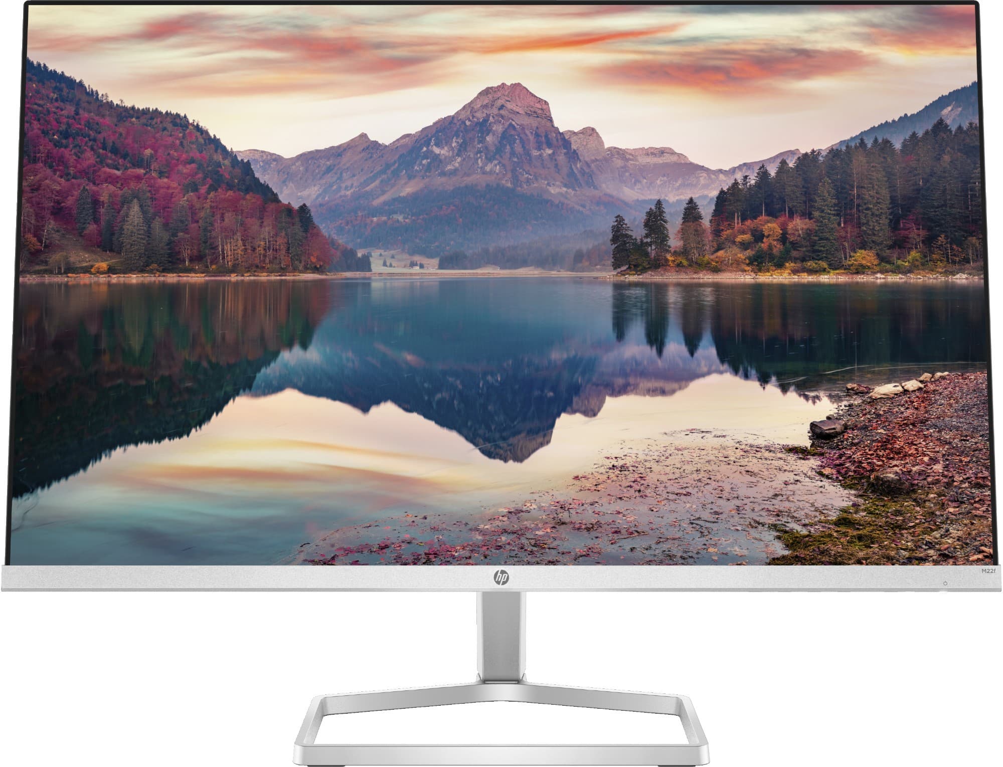 HP M22f FHD Monitor features a sleek white frame, a slim profile, and a stand with a modern design, displaying a vibrant landscape with mountains and a reflective lake.