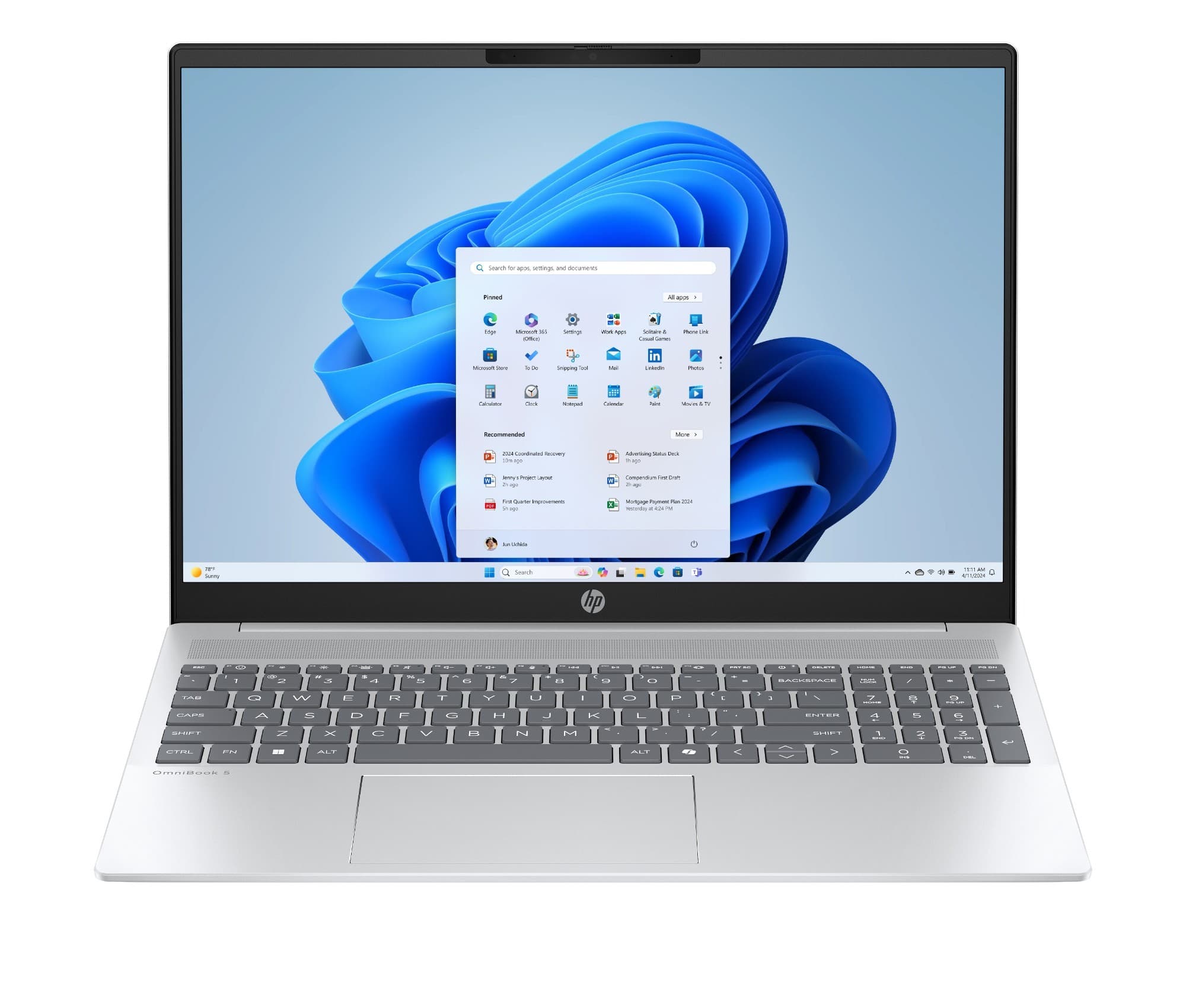 Sleek silver HP OmniBook 5 AI laptop featuring a 16-inch display, Intel Core Ultra 7 processor, and a modern keyboard layout, running Windows 11.