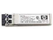 Silver and black HPE Aruba Networking X130 10G SFP+ LC LR transceiver with a label featuring technical specifications and two optical connectors on one end.