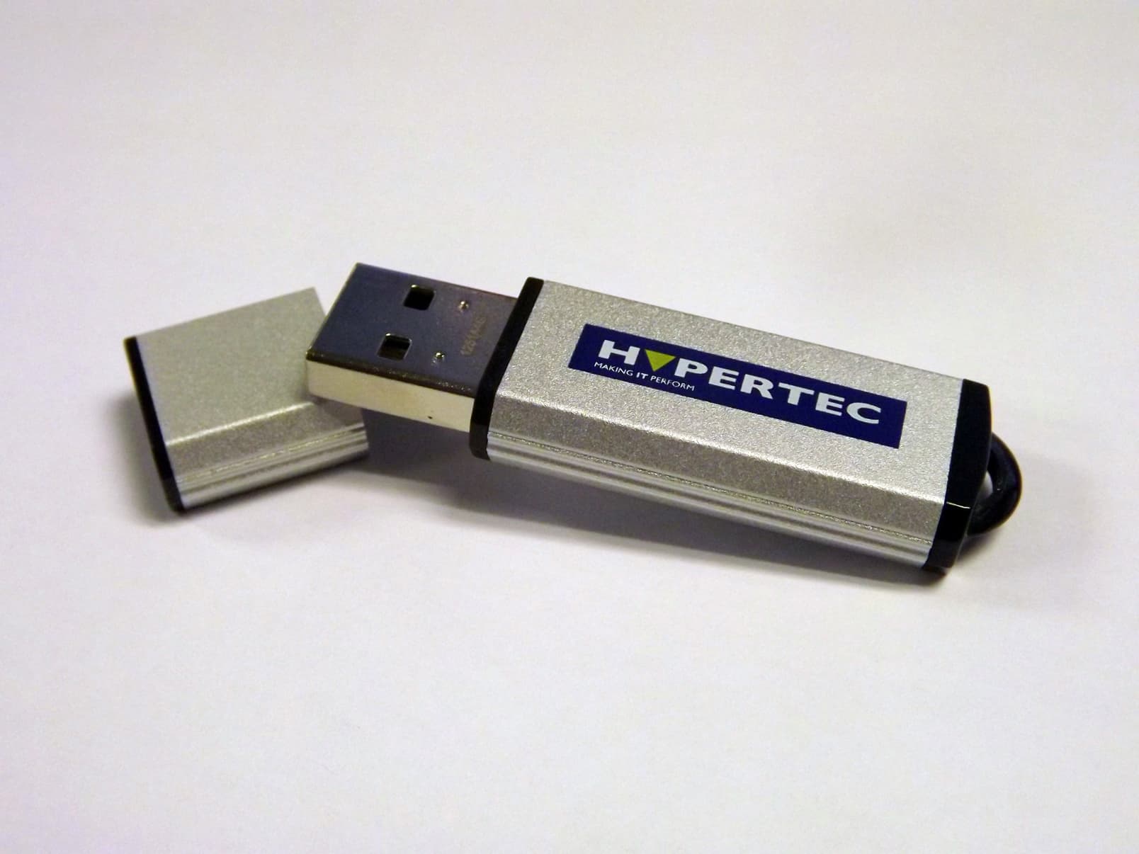 Silver and black Hypertec 32GB USB 3.0 flash drive with a removable cap, featuring the "HYPERTEC" logo prominently on the side.