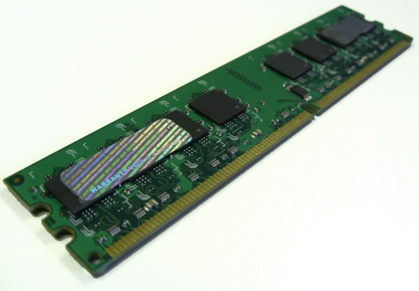 Green circuit board memory module with a gold connector edge, featuring multiple black chips and a holographic label, labeled as Hypertec 512MB DIMM PC2-5300.