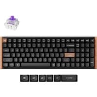 Black Keychron K4 HE keyboard with brown key, wireless connectivity, and purple switch, includes extra keycaps.