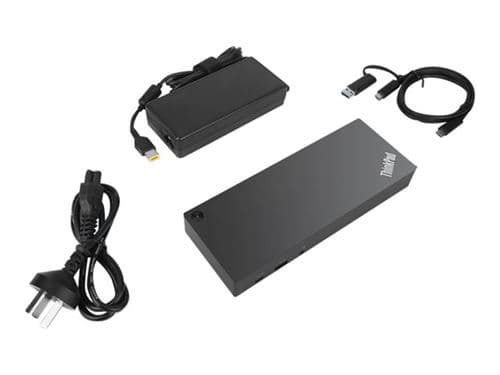 Black Lenovo 40AF0135IT laptop dock with multiple ports, including USB 3.2 Gen 2, accompanied by a power adapter and cables for connectivity.