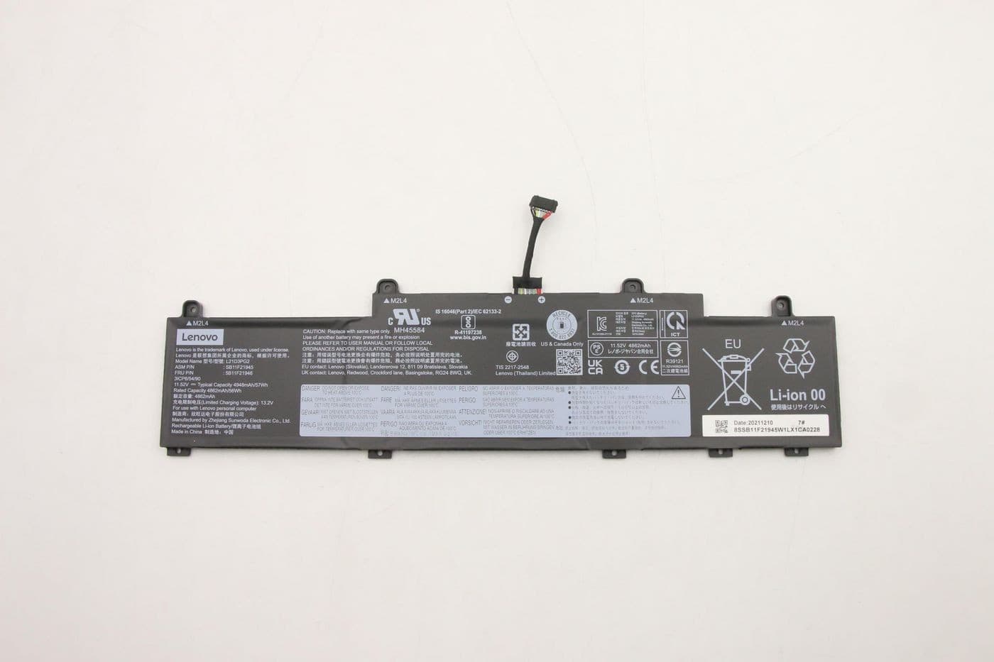 Black Lenovo 57Wh 3-cell lithium-ion battery with a label detailing specifications, safety symbols, and a connector cable on one end.