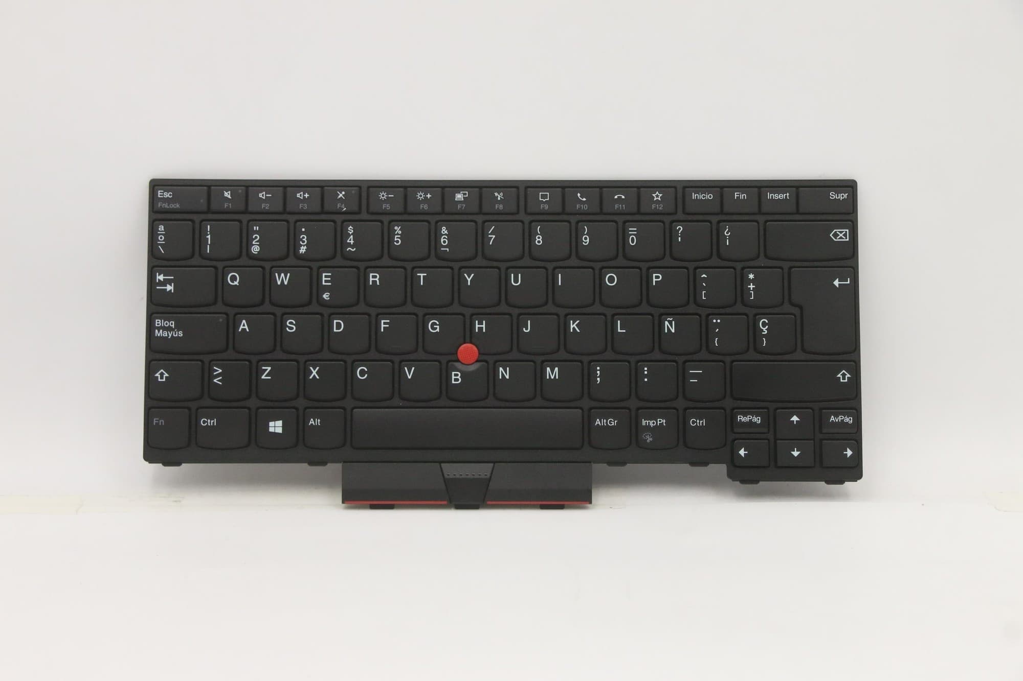 Black Lenovo laptop keyboard with a compact layout, featuring white lettering on keys, a red trackpoint in the center, and a sturdy plastic base.