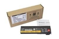 Black Lenovo laptop battery with a yellow label, placed next to a brown cardboard box and a user manual, showcasing its compact design and specifications.