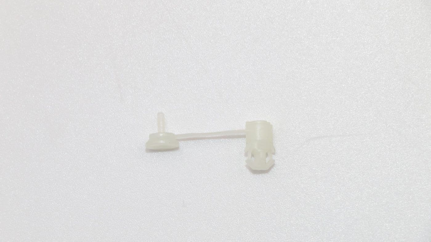 White plastic Lenovo Iny3 KY Clip D5 3, featuring a small round base and a thin connector, designed for secure attachment in electronic devices.