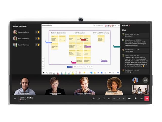 An 85-inch Microsoft Surface Hub 3 with a sleek black frame, featuring a touchscreen display showing collaborative content and video call participants at the bottom.