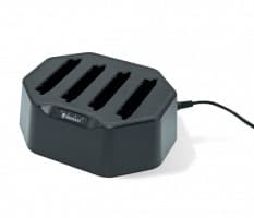 Black octagonal mobile device charger with four slots for charging, featuring a power indicator light and a connected power cable.