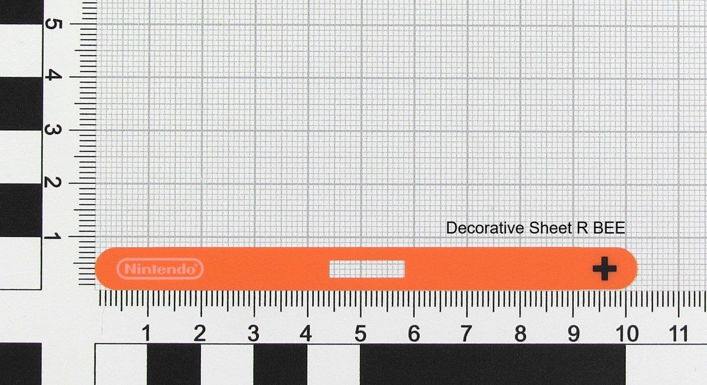 Bright orange decorative sheet with a grid pattern, featuring a Nintendo logo and a plus sign, designed for use with gaming systems.