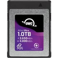 OWC Atlas Ultra 1TB CFexpress card with silver and black casing, purple label, and read/write speeds displayed.