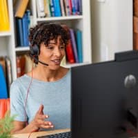 Poly Blackwire 5210 monaural headset with USB-C, 3.5mm plug, and USB-C/A adapter, featuring a sleek black design.