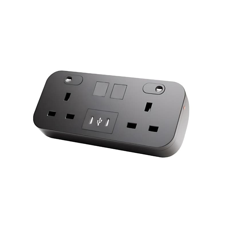 Black desktop power strip with two UK power sockets, dual USB-C ports, and a sleek, rounded design, featuring a textured surface and a compact form factor.