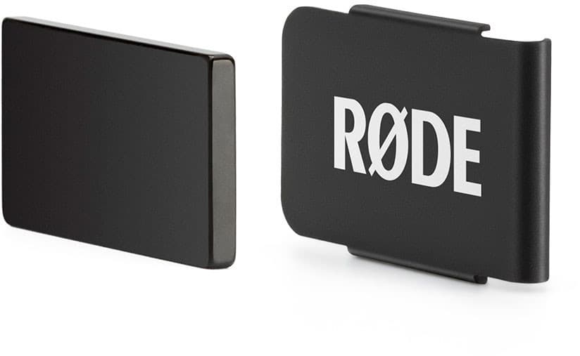 Black metal clip with a sleek design, featuring the white "RØDE" logo on one side and a smooth, glossy finish on the other.
