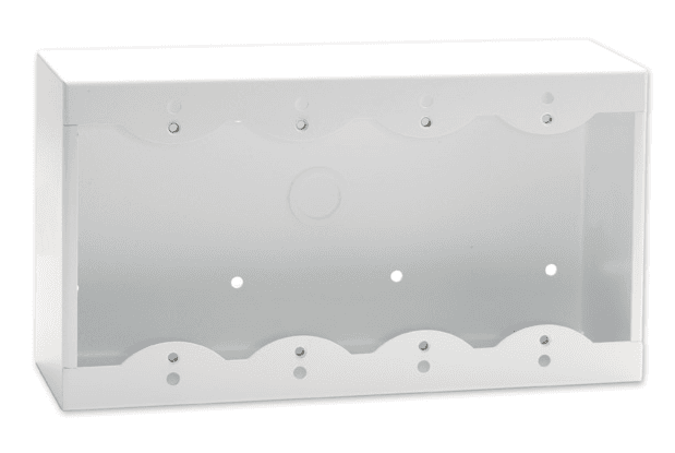 White metal surface mount box designed for four Decora remote controls and panels, featuring a smooth finish and multiple mounting holes.