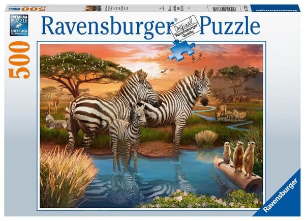 Ravensburger 500-piece puzzle featuring zebras at a waterhole, with lush greenery, a serene landscape, and playful meerkats in the foreground.