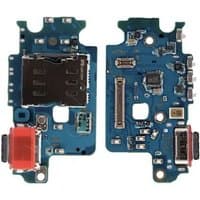 Blue Samsung Galaxy S24 charging port circuit board with connectors and microchip components.