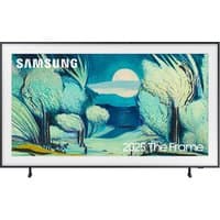 Samsung 65" LS03F The Frame 4K QLED Smart TV with black bezel, displaying art with trees and a moonlit landscape.
