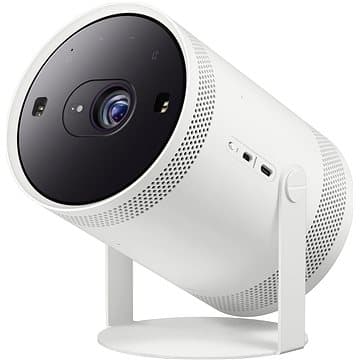 White Samsung SP-LFF3CLAXXXH data projector with a cylindrical design, a black lens front, ventilation holes, and side control buttons, mounted on a sleek white stand.