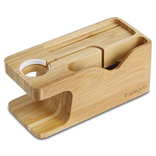 Bamboo dock station with a sleek design, featuring slots for a smartwatch and smartphone, a circular cutout for charging, and the SPIGEN logo engraved on the side.