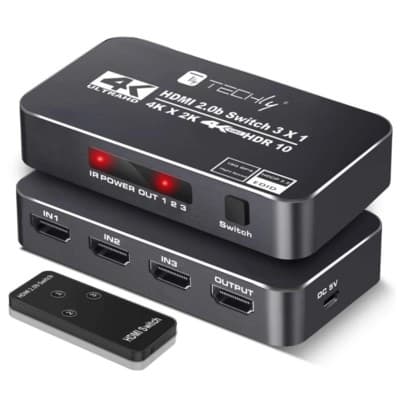 Black HDMI switch with three input ports, one output port, and a remote control; features 4K resolution and HDR support, with a sleek, compact design.