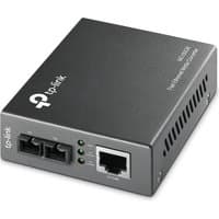 Black TP-Link MC100CM media converter with Ethernet port, fiber connectors, and LED indicators on the front panel.