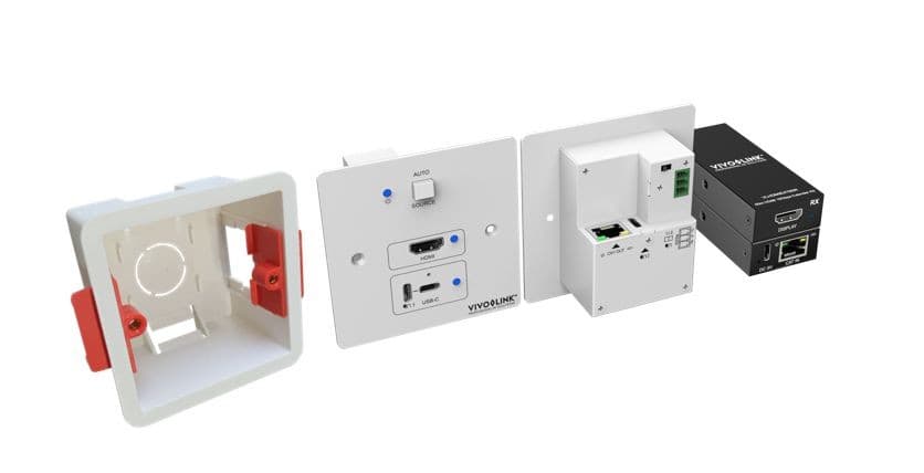 White AV wall plate with red clips, featuring ports for HDMI and USB, accompanied by a compact black AV extender unit with Ethernet and HDMI connections.