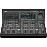 Black Yamaha DM7 audio mixer with 120 channels, featuring multiple faders, knobs, and a central digital display.