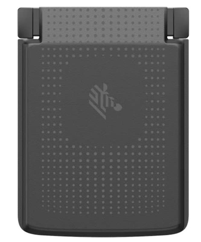 Black handheld battery accessory with a textured surface, featuring a dotted pattern and the Zebra logo in the center, designed for mobile computers.
