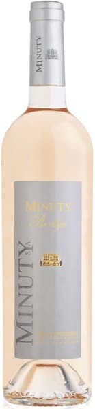 A light pink bottle of Chateau Minuty Prestige Rosé 2025 with a sleek silver label featuring the brand name and logo, showcasing an elegant design.