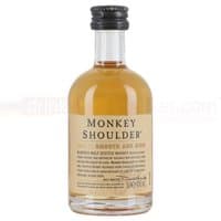 Miniature bottle of Monkey Shoulder Whisky with beige label and black cap, 5cl size.