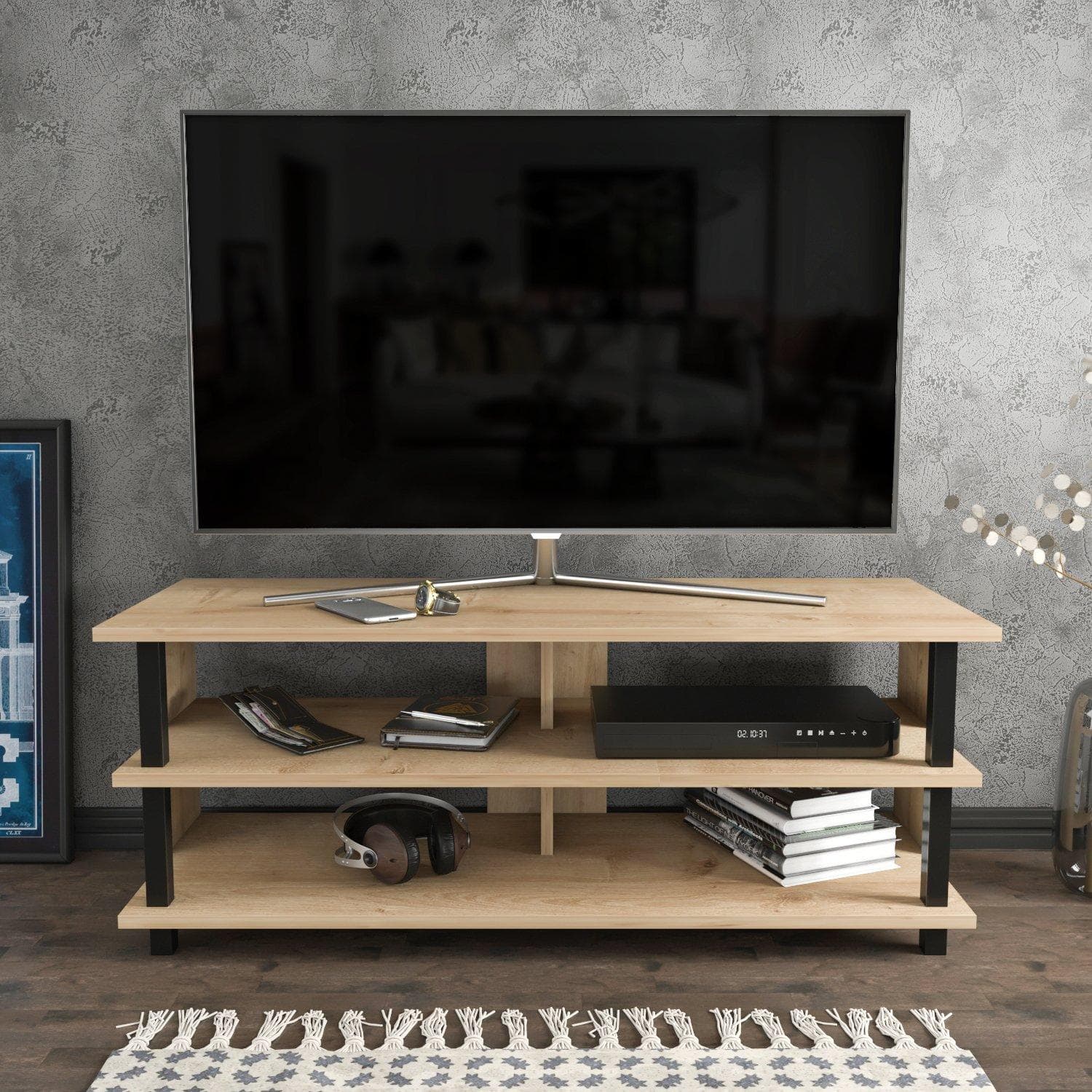 Black and oak TV stand with open shelves, featuring a sleek design, sturdy black metal legs, and ample storage space for media devices and decor.
