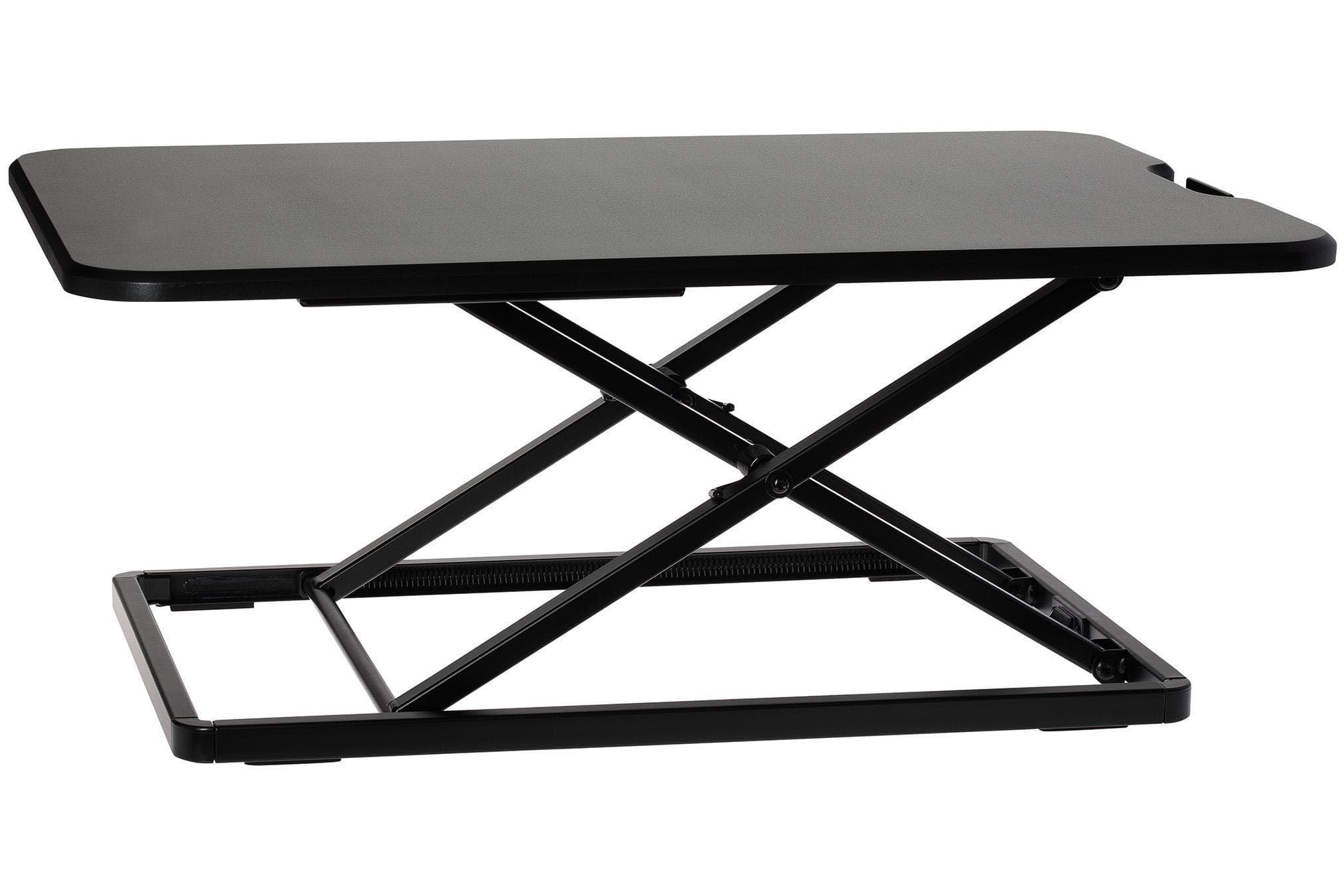 Black slim stand-up desk workstation with a smooth top surface, adjustable height mechanism, and a sturdy metal frame for ergonomic workspace solutions.