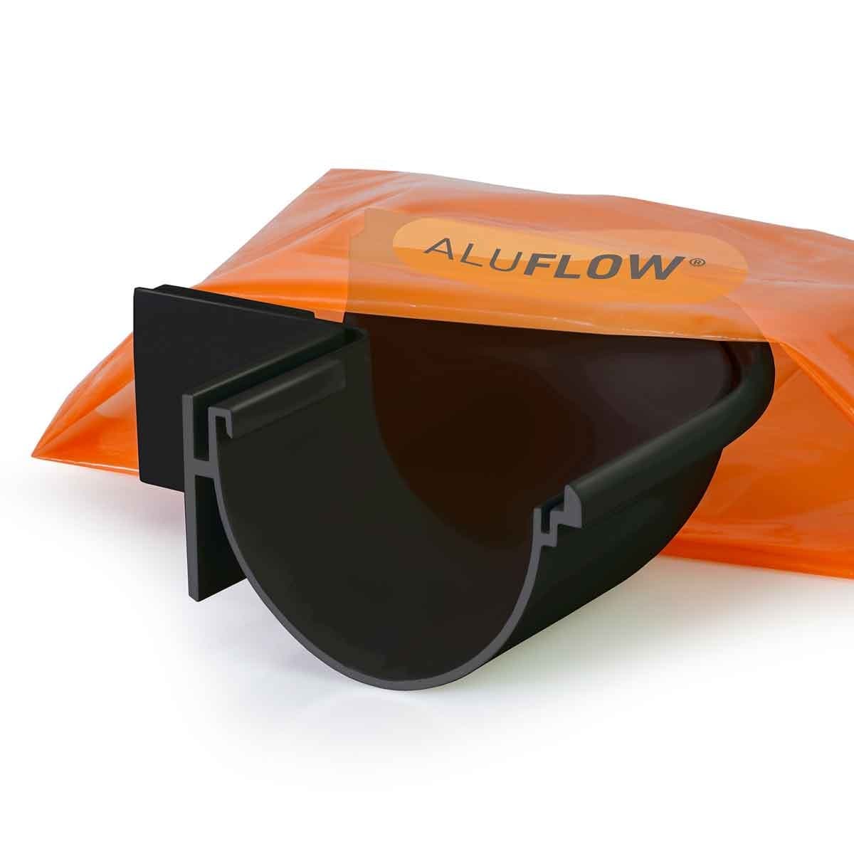Deepflow 90-degree external angle gutter in black, made from durable aluminum, featuring a sleek design and packaged in an orange bag labeled "ALUFLOW."