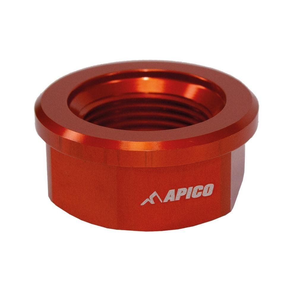 Orange anodized aluminum axle nut with a threaded interior, featuring the "APICO" logo prominently displayed on the side, designed for specific KTM, Husqvarna, and Gas Gas models.