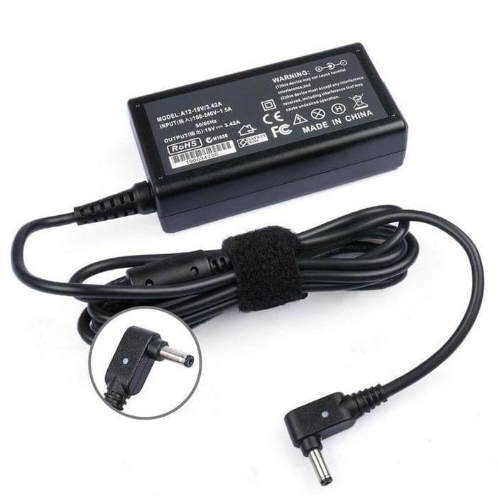 Black 65W power adapter with a rectangular body, featuring a textured surface, a long black cable, and a circular connector tip, labeled with model and safety information.