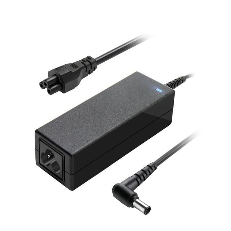 Black power adapter/inverter with a sleek design, featuring a rectangular shape, power input connector, and a round output plug, labeled as CoreParts MBXLG-AC0002, rated at 25 W.