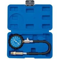 Blue Draper petrol compression tester with gauge, black hose, and brass fitting in a blue plastic case.