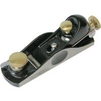 Black and silver Faithfull block plane with brass adjustment knobs in a wooden box.