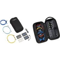 Fluke FMC-10G network analyser accessory set with cables, connectors, and black carrying case with compartments.