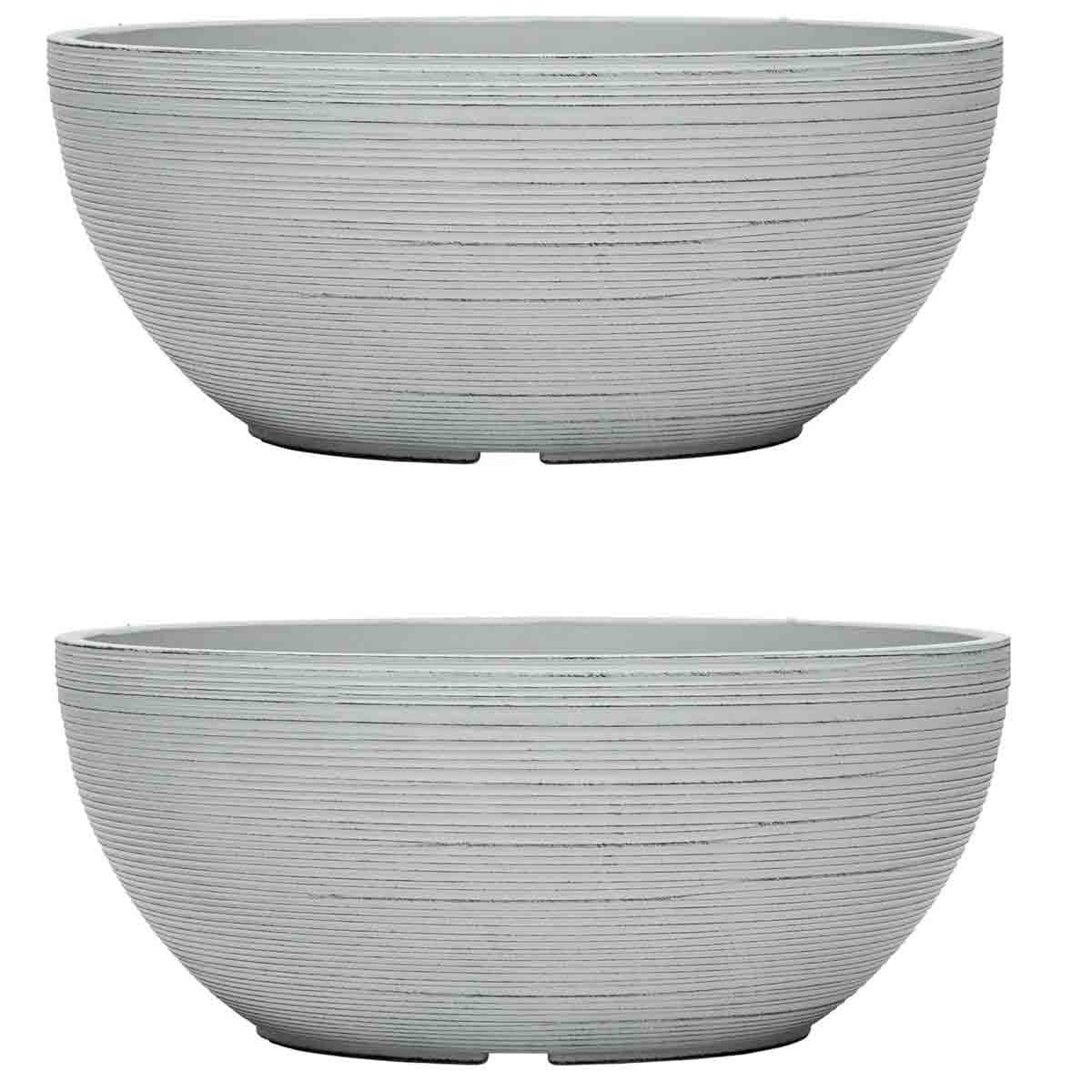 Light grey, ribbed ceramic planter set of two, each 35 cm in diameter, with a smooth finish and rounded shape, suitable for indoor or outdoor use.