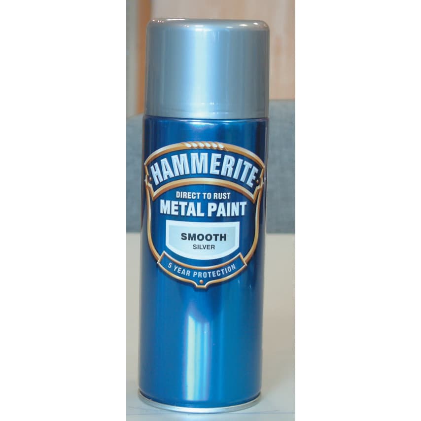 Silver aerosol can with a smooth finish label, featuring the Hammerite logo, "Direct to Rust Metal Paint," and a 5-year protection claim.